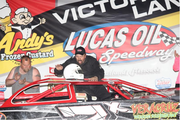 Todd McCoin celebrates his feature win the ALPS Food Stores ULMA Late Model division Saturday night. (Chris Bork photo)