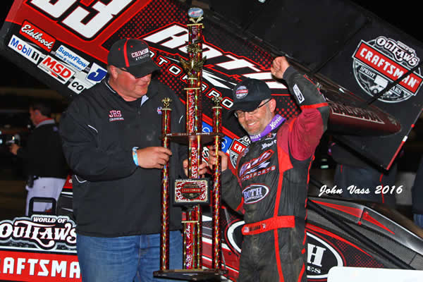 A very happy Joey Saldana cebrates after winning the World of Outlaw feature at the Jacksonville Speedway. Photo by John Vass