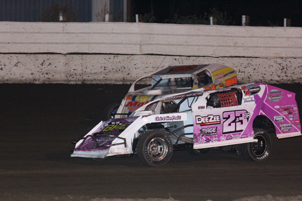 Nick Roberts (23JR) of Des Moines, IA battling with Bruce Hanford (61) of Davenport, IA.   Photo by Brian Neal